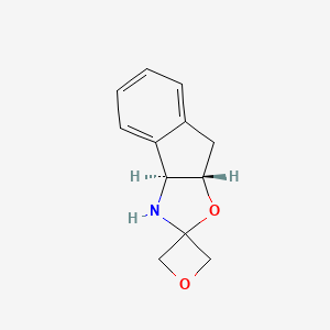 (3aS,8aS)-3,3a,8,8a-tetrahydrospiro[indeno[1,2-d]oxazole-2,3'-oxetane]